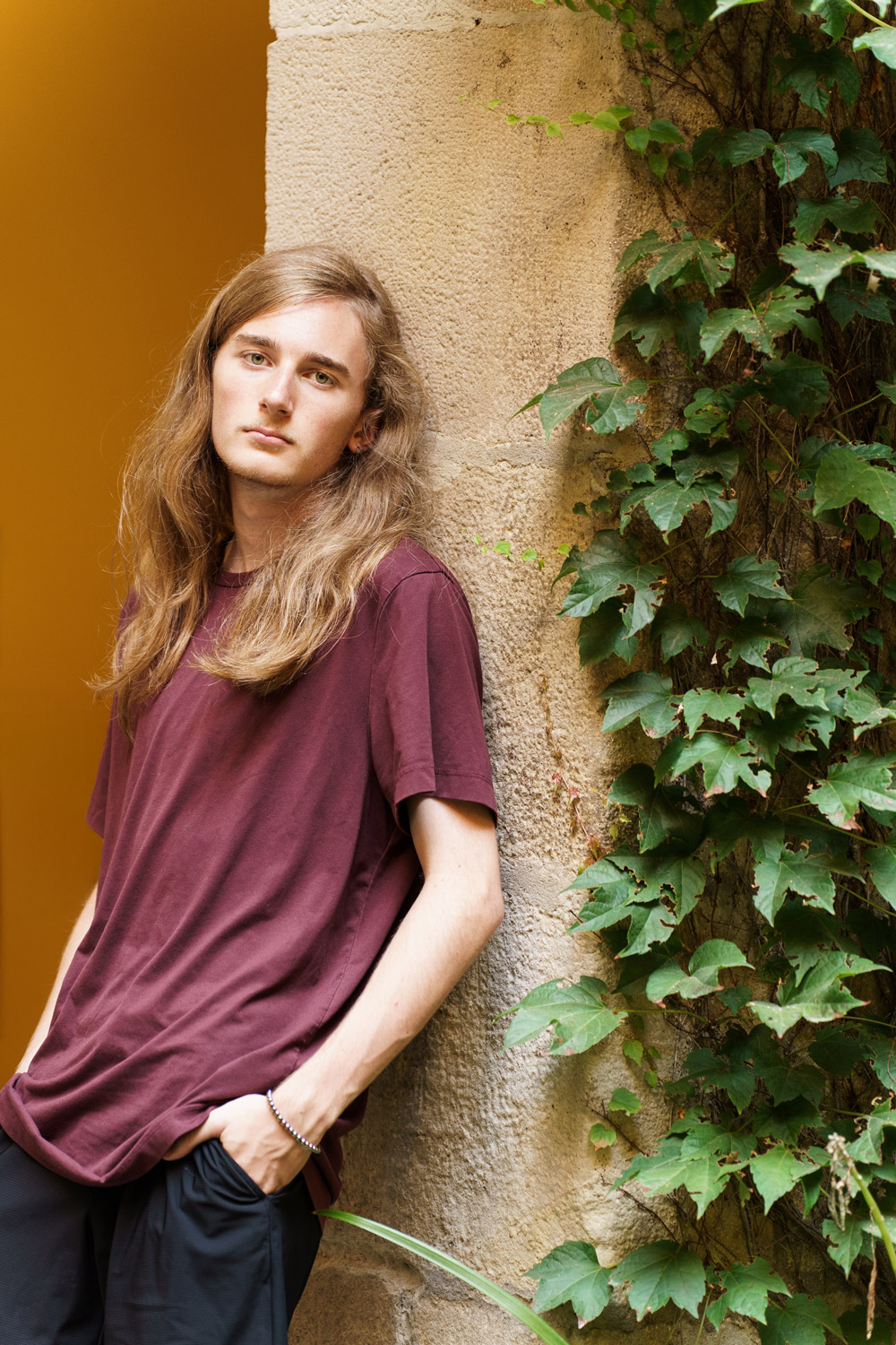 Vertical senior portrait of Tyson in Barcelona